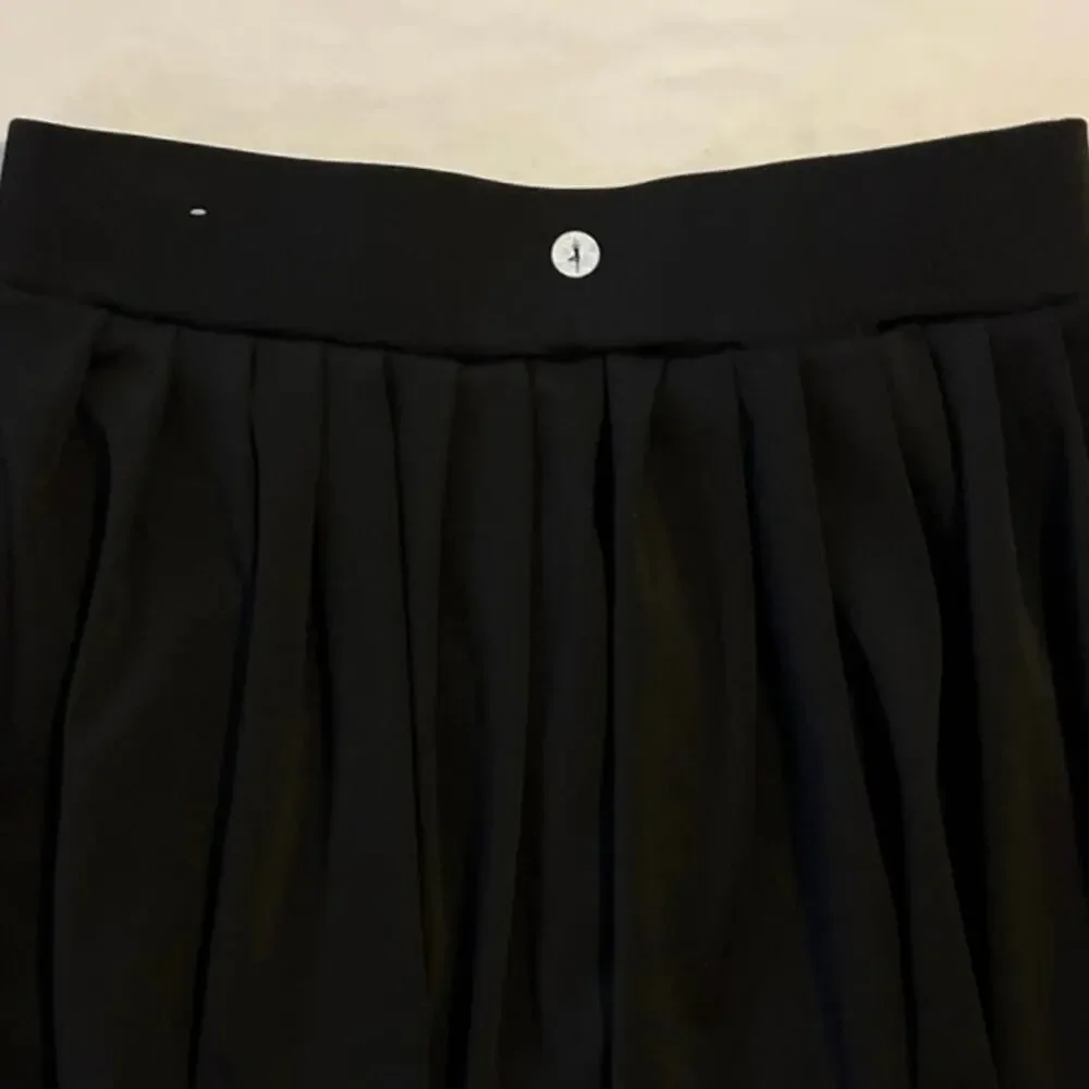 Indero Black Tennis Skort Womens Size L Pleated Feminine Pickleball Stretch Mini